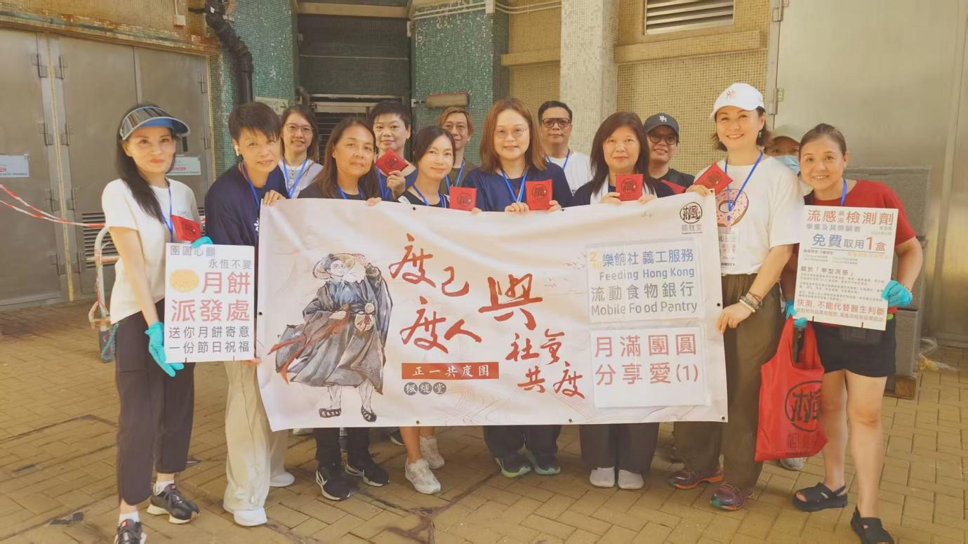 A group of people holding a banner

AI-generated content may be incorrect.