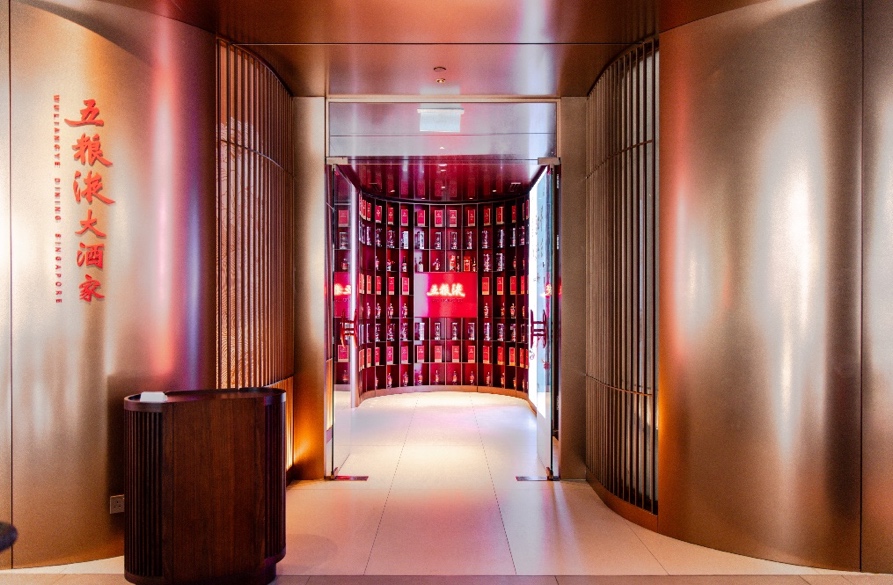 A hallway with red walls and a door
AI-generated content may be incorrect.